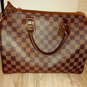 Handbag with lock and key